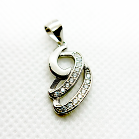 A silver pendant with a swirling design and embedded with small diamonds