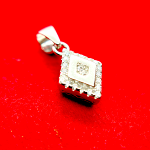 A square-shaped pendant with a concentric diamond design, surrounded by smaller diamonds