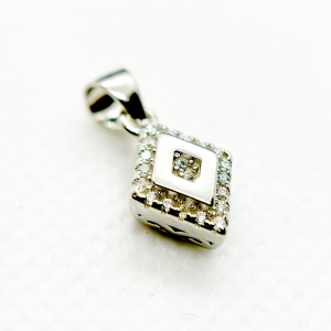 A square-shaped pendant with a concentric diamond design, surrounded by smaller diamonds