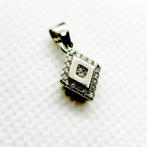 A square-shaped pendant with a concentric diamond design, surrounded by smaller diamonds