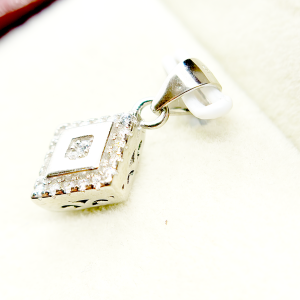 A square-shaped pendant with a concentric diamond design, surrounded by smaller diamonds