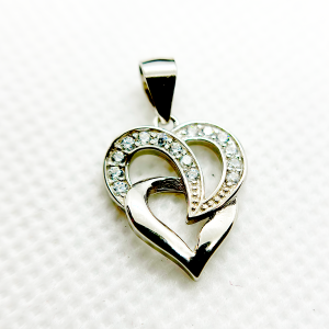 A silver heart-shaped pendant with an intertwined design and small diamond