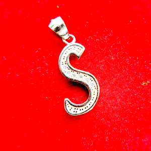 Silver letter S pendant with embedded diamonds