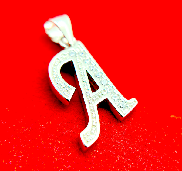 Silver letter A pendant with embedded diamonds